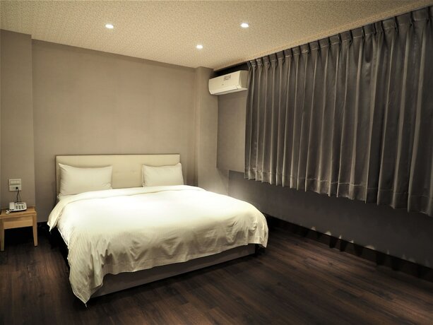Imagen de la habitación del Hotel Day Chen. Foto 15
