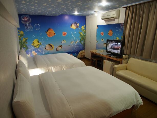 Imagen de la habitación del Hotel Day Chen. Foto 19