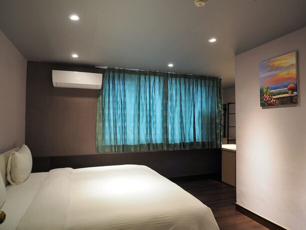 Imagen de la habitación del Hotel Day Chen. Foto 23