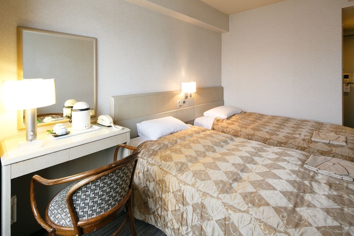 Imagen de la habitación del Hotel Day Nice Tokyo. Foto 12