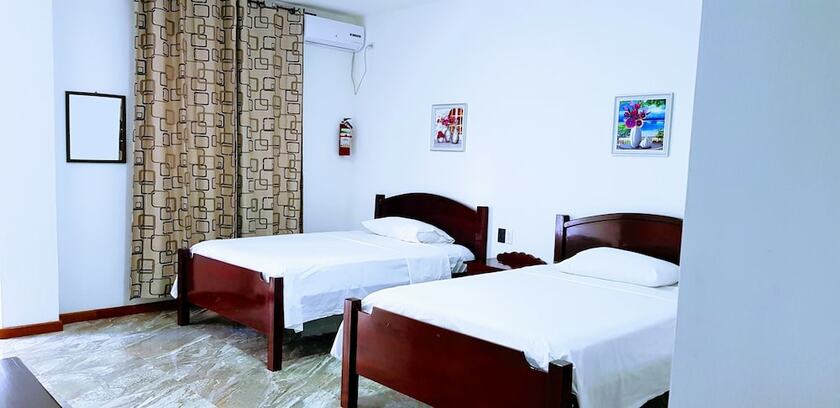 Imagen de la habitación del Hotel Day and Night. Foto 14