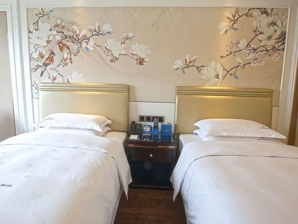 Imagen de la habitación del Hotel Dayhello International. Foto 6