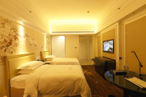 Imagen de la habitación del Hotel Dayhello International. Foto 15