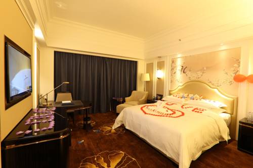 Imagen de la habitación del Hotel Dayhello International. Foto 16