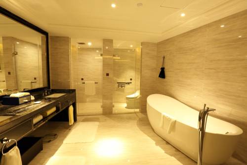Imagen de la habitación del Hotel Dayhello International. Foto 17