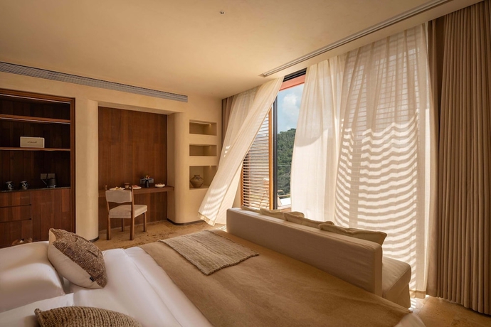 Imagen de la habitación del Hotel Dayoo Resort. Foto 8