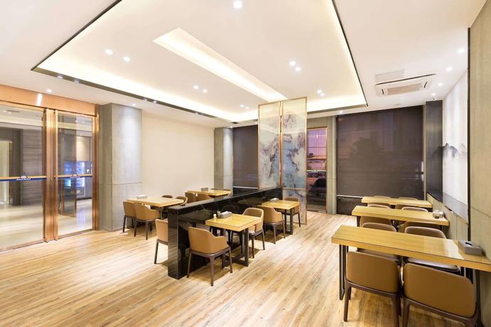 Imagen del bar/restaurante del Hotel Days By Wyndham Changle Jinfeng Xinfuyuan. Foto 2