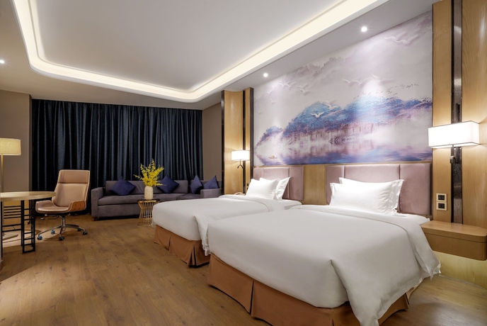 Imagen de la habitación del Hotel Days By Wyndham Guangzhou Hantian. Foto 9