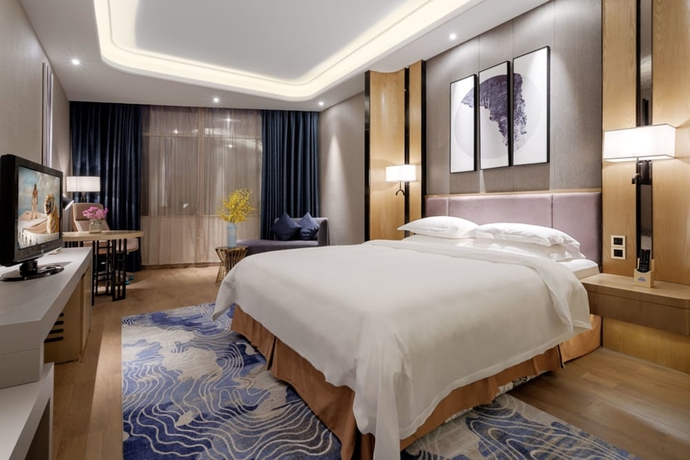 Imagen de la habitación del Hotel Days By Wyndham Guangzhou Hantian. Foto 15