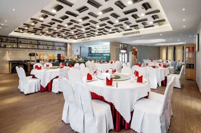 Imagen del bar/restaurante del Hotel Days By Wyndham Guangzhou Hantian. Foto 5
