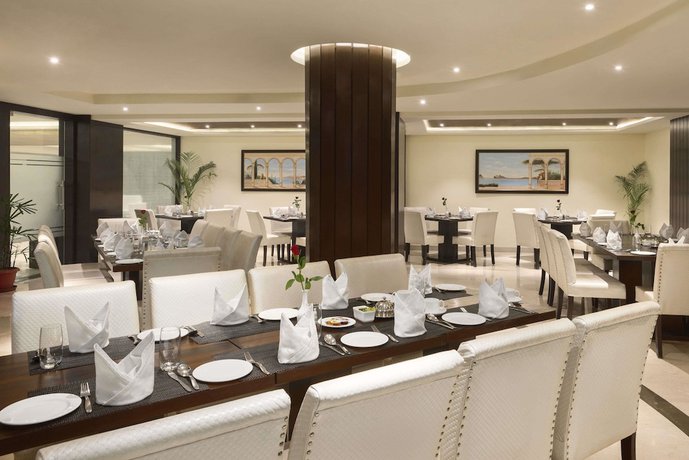 Imagen del bar/restaurante del Hotel Days By Wyndham Jalandhar Jyoti Chowk. Foto 2
