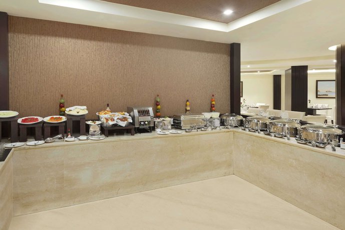 Imagen del bar/restaurante del Hotel Days By Wyndham Jalandhar Jyoti Chowk. Foto 3