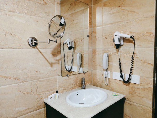 Imagen de la habitación del Hotel Days By Wyndham Jalandhar Jyoti Chowk. Foto 13