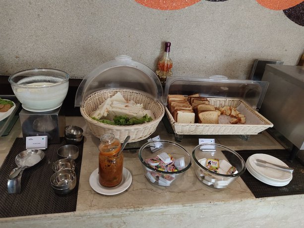 Imagen del bar/restaurante del Hotel Days By Wyndham Jalandhar Jyoti Chowk. Foto 6