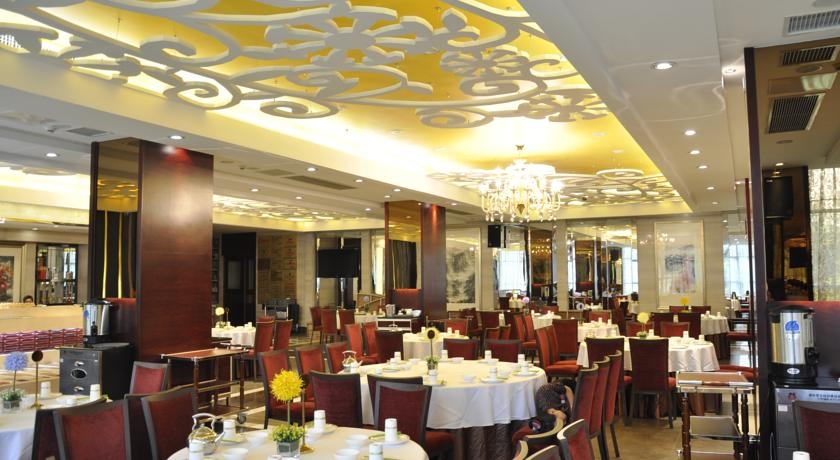 Imagen del bar/restaurante del Hotel Days Hotel Hotspring Fuzhou. Foto 2