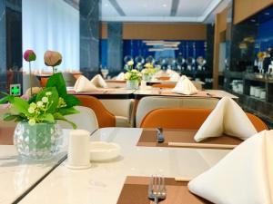 Imagen del bar/restaurante del Hotel Days Hotel by Wyndham Bishan Chongqing. Foto 6
