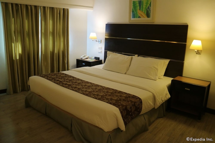 Imagen de la habitación del Hotel Days Iloilo. Foto 11