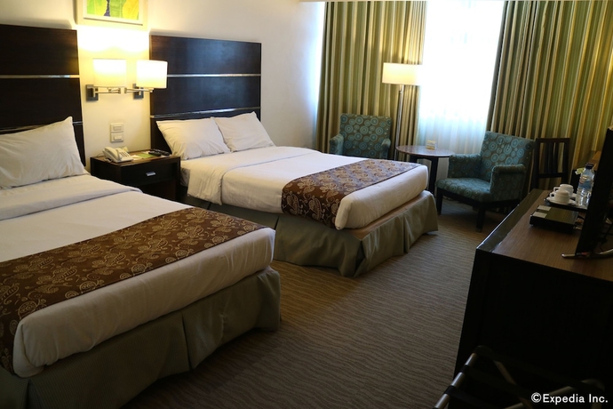 Imagen de la habitación del Hotel Days Iloilo. Foto 14