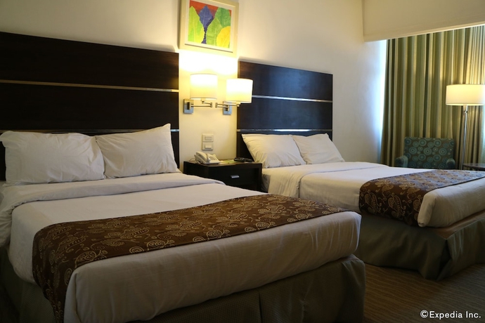 Imagen de la habitación del Hotel Days Iloilo. Foto 16