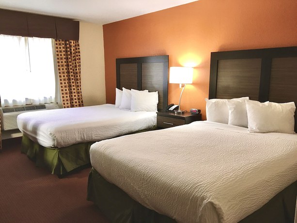 Imagen de la habitación del Hotel Days Inn And Suites By Wyndham Traverse City. Foto 11