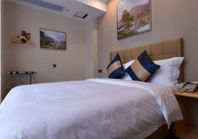 Imagen de la habitación del Hotel Days Inn Business Place Bagu Chongqing. Foto 4