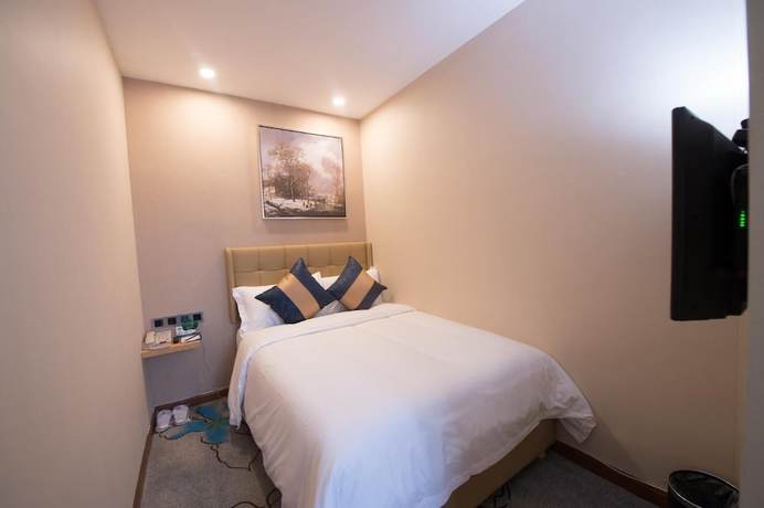 Imagen de la habitación del Hotel Days Inn Business Place Bagu Chongqing. Foto 12