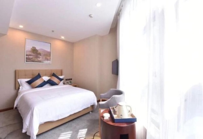 Imagen de la habitación del Hotel Days Inn Business Place Bagu Chongqing. Foto 14