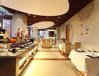Imagen del bar/restaurante del Hotel Days Inn Business Place @ Chongqing Fortune Plaza. Foto 3