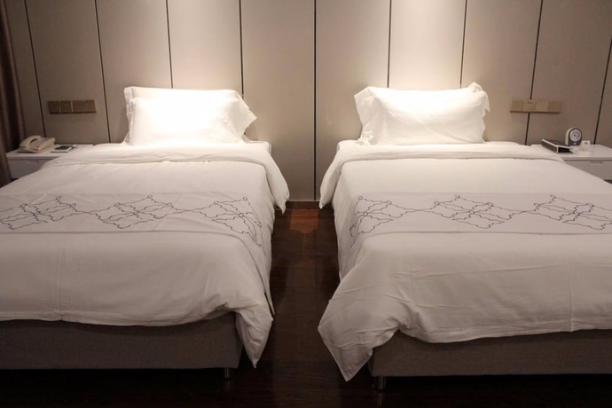 Imagen de la habitación del Hotel Days Inn Business Place Goldwin Yantai. Foto 9
