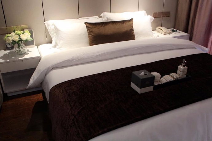 Imagen de la habitación del Hotel Days Inn Business Place Goldwin Yantai. Foto 11