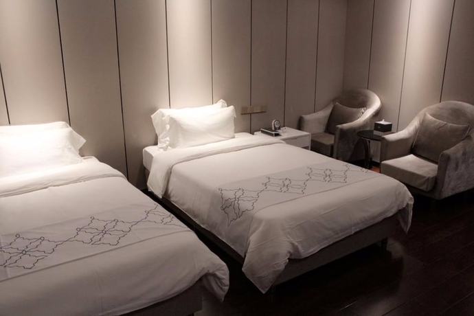 Imagen de la habitación del Hotel Days Inn Business Place Goldwin Yantai. Foto 12