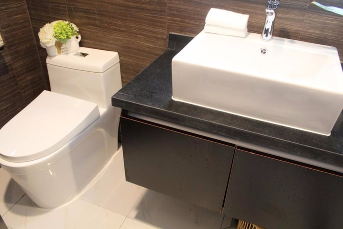 Imagen de la habitación del Hotel Days Inn Business Place Goldwin Yantai. Foto 16