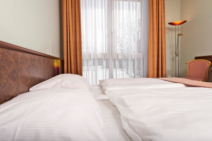 Imagen de la habitación del Hotel Days Inn By Wyndham Dessau. Foto 7