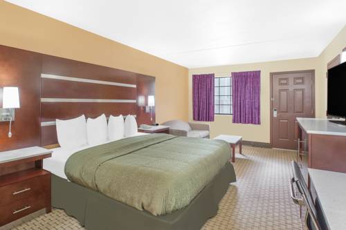 Imagen de la habitación del Hotel Days Inn By Wyndham Fayetteville. Foto 3