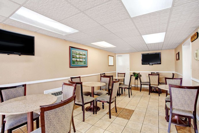 Imagen del bar/restaurante del Hotel Days Inn By Wyndham Knoxville West. Foto 3