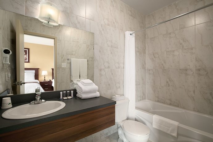 Imagen de la habitación del Hotel Days Inn By Wyndham Montreal East. Foto 7