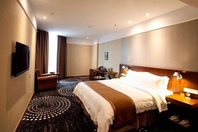 Imagen de la habitación del Hotel Days Inn Chongqing Guangyu Shangbin. Foto 2