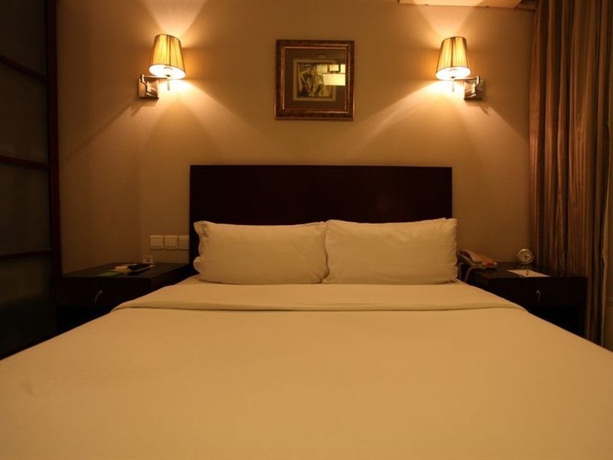 Imagen de la habitación del Hotel Days Inn Forbidden City. Foto 3