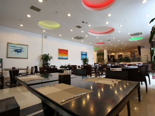 Imagen del bar/restaurante del Hotel Days Inn Forbidden City. Foto 2