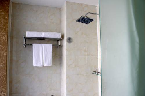Imagen de la habitación del Hotel Days Inn Frontier Qingdao Airport. Foto 4