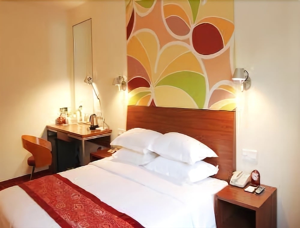 Imagen de la habitación del Hotel Days Inn Guangzhou. Foto 6