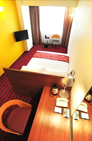 Imagen de la habitación del Hotel Days Inn Guangzhou. Foto 7