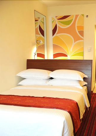 Imagen de la habitación del Hotel Days Inn Guangzhou. Foto 11