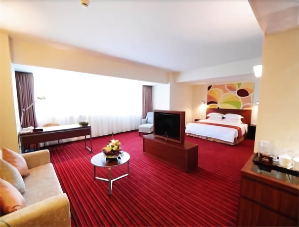 Imagen de la habitación del Hotel Days Inn Guangzhou. Foto 13