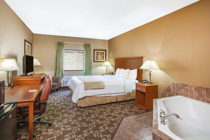 Imagen de la habitación del Hotel Days Inn & Suites By Wyndham Cabot. Foto 14