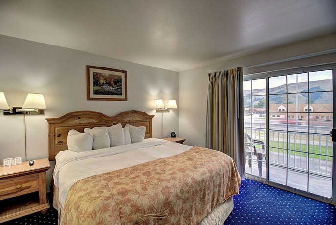 Imagen de la habitación del Hotel Days Inn & Suites By Wyndham Lolo. Foto 7