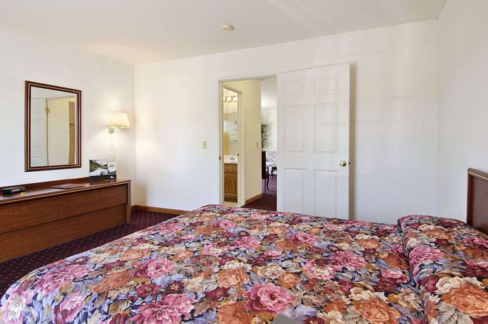 Imagen de la habitación del Hotel Days Inn & Suites By Wyndham Lolo. Foto 9