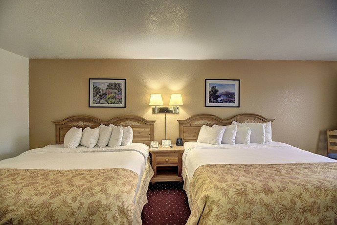 Imagen de la habitación del Hotel Days Inn & Suites By Wyndham Lolo. Foto 13