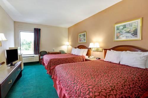 Imagen de la habitación del Hotel Days Inn & Suites By Wyndham Louisville Sw. Foto 3