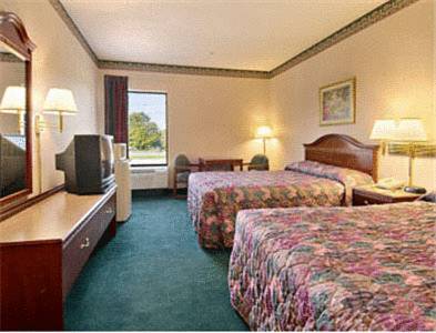 Imagen de la habitación del Hotel Days Inn & Suites By Wyndham Louisville Sw. Foto 5